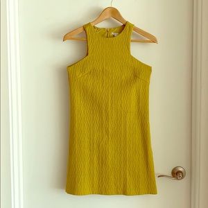 High neck dress. Semi-lined. Fits true to size